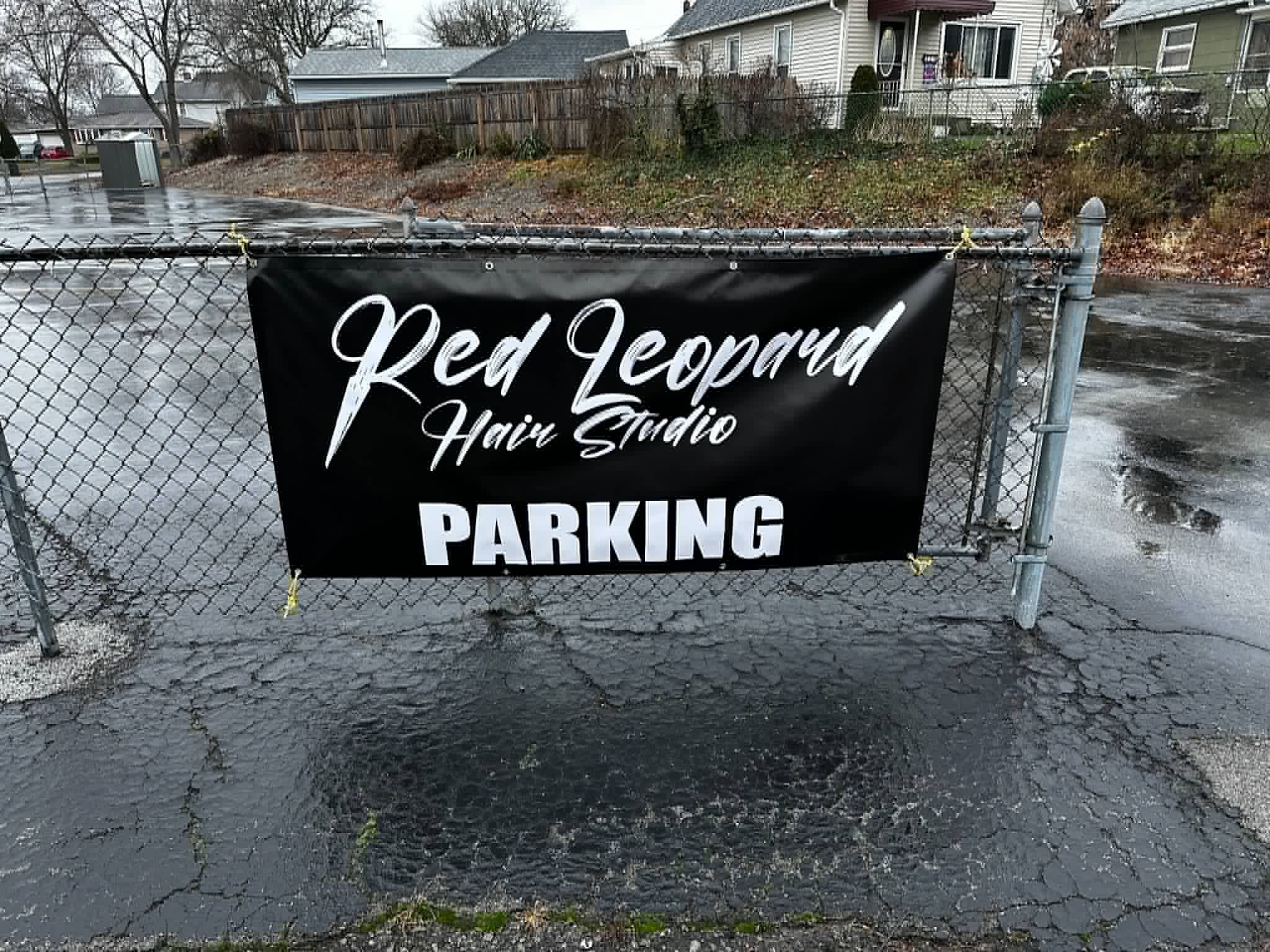 Red Leopard Hair Studio parking banner